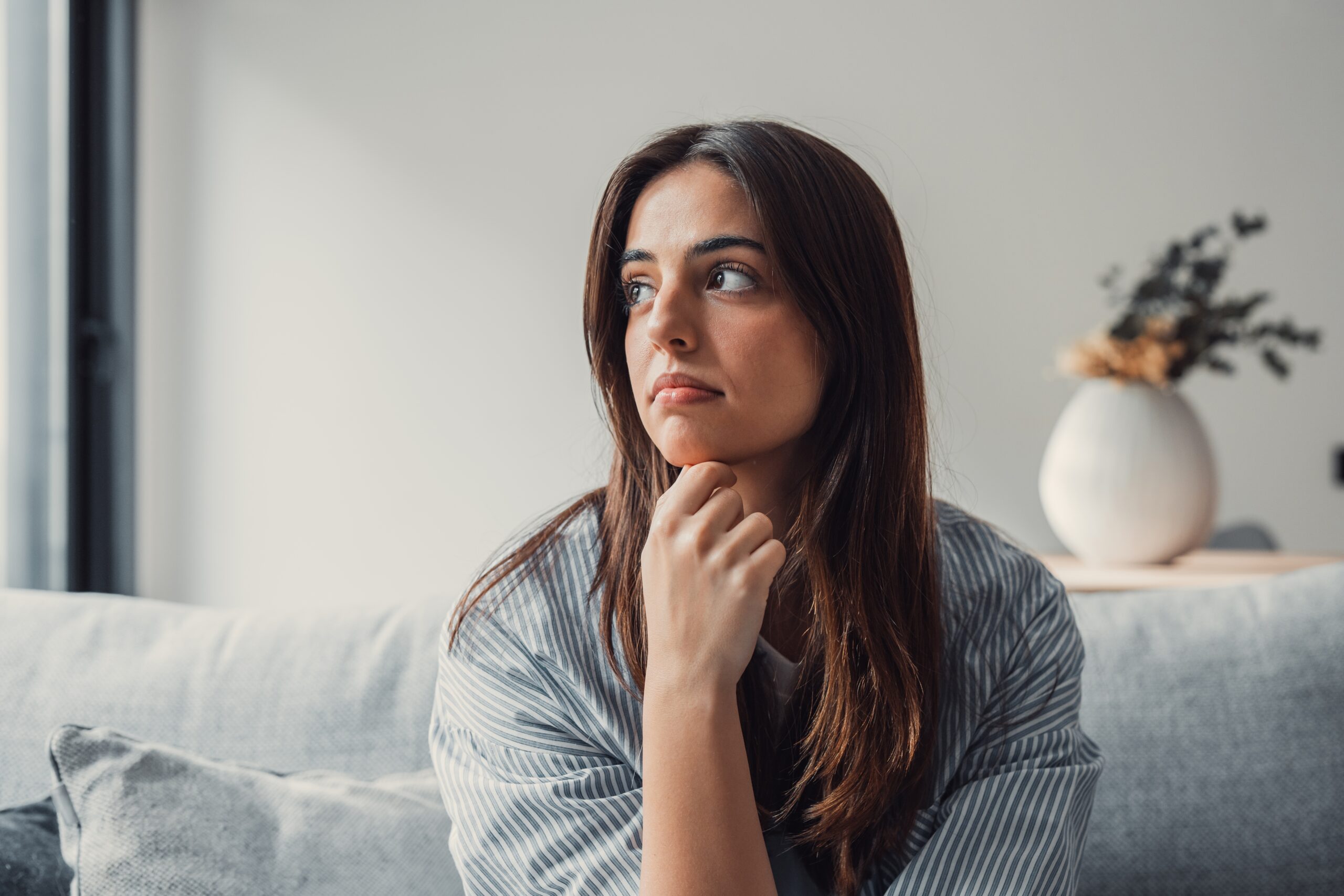 Woman considering PRP hair treatment options in Japan.