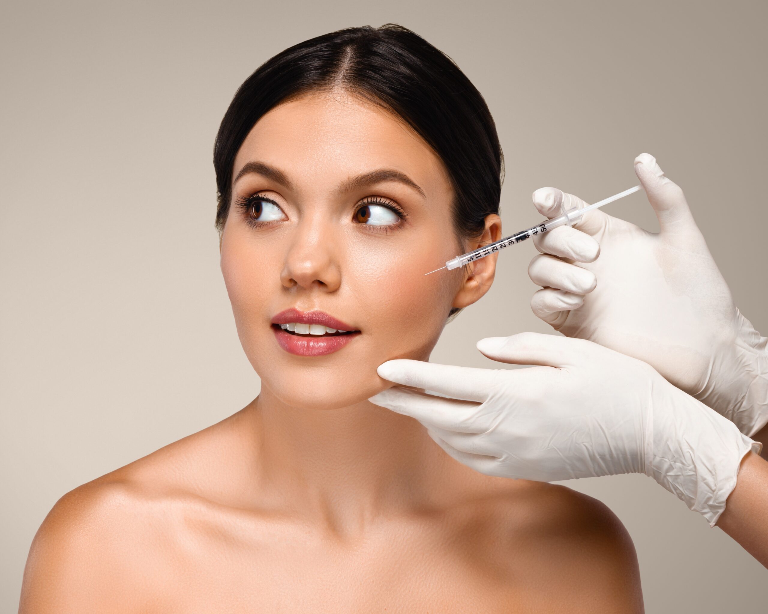 A woman receiving injectable treatment