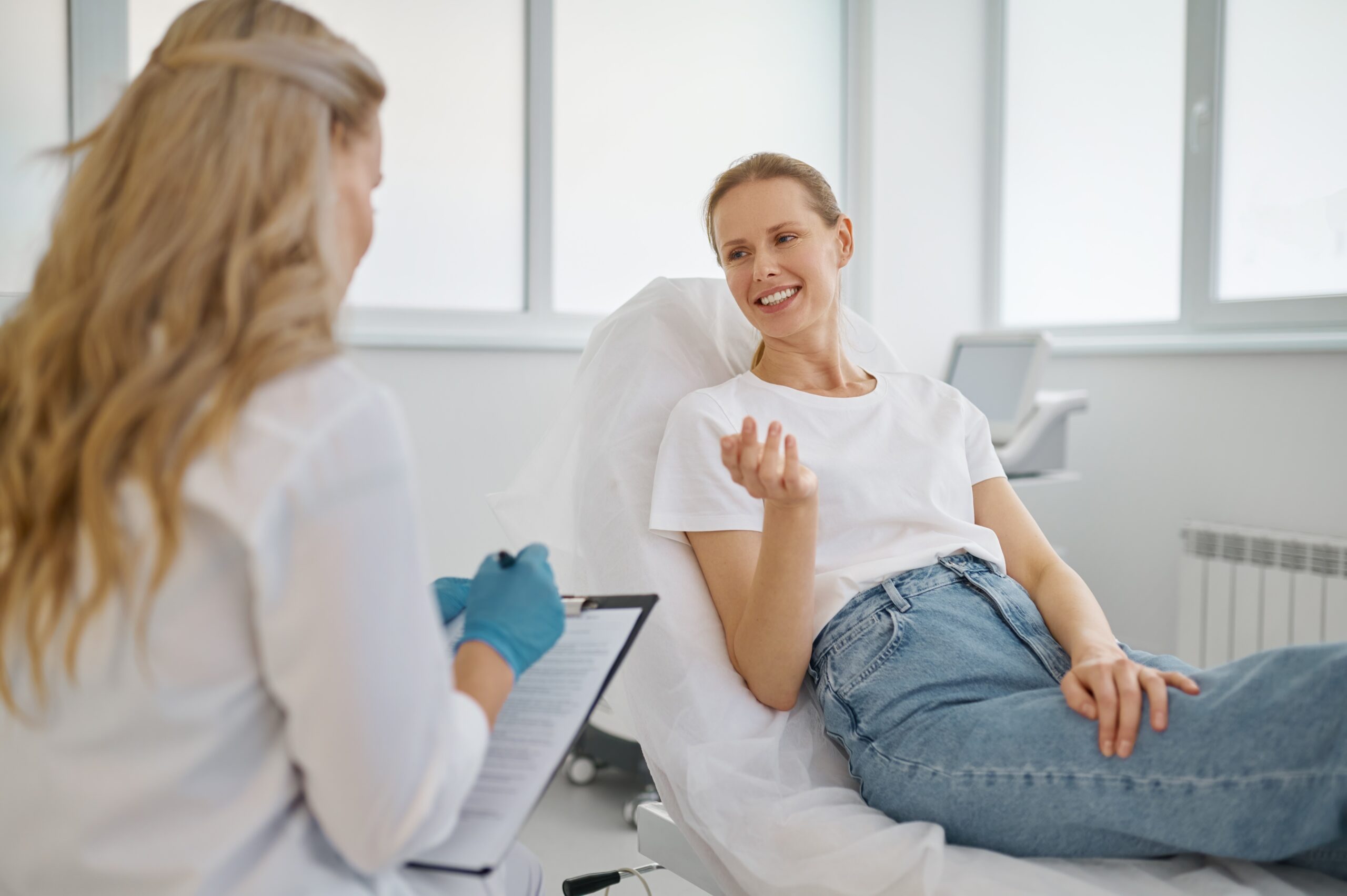 Woman receiving a consultation scaled