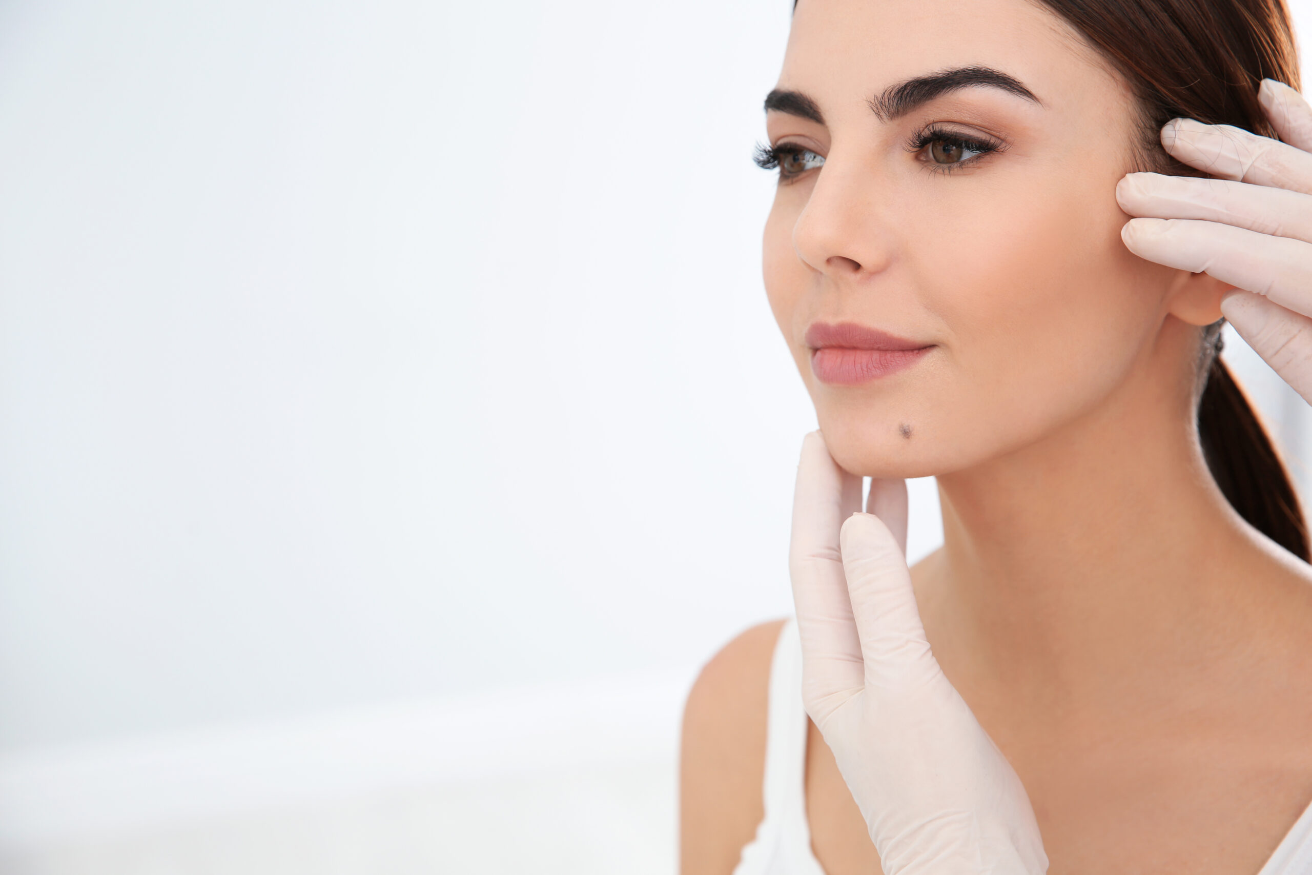 Woman receiving a medical examination scaled