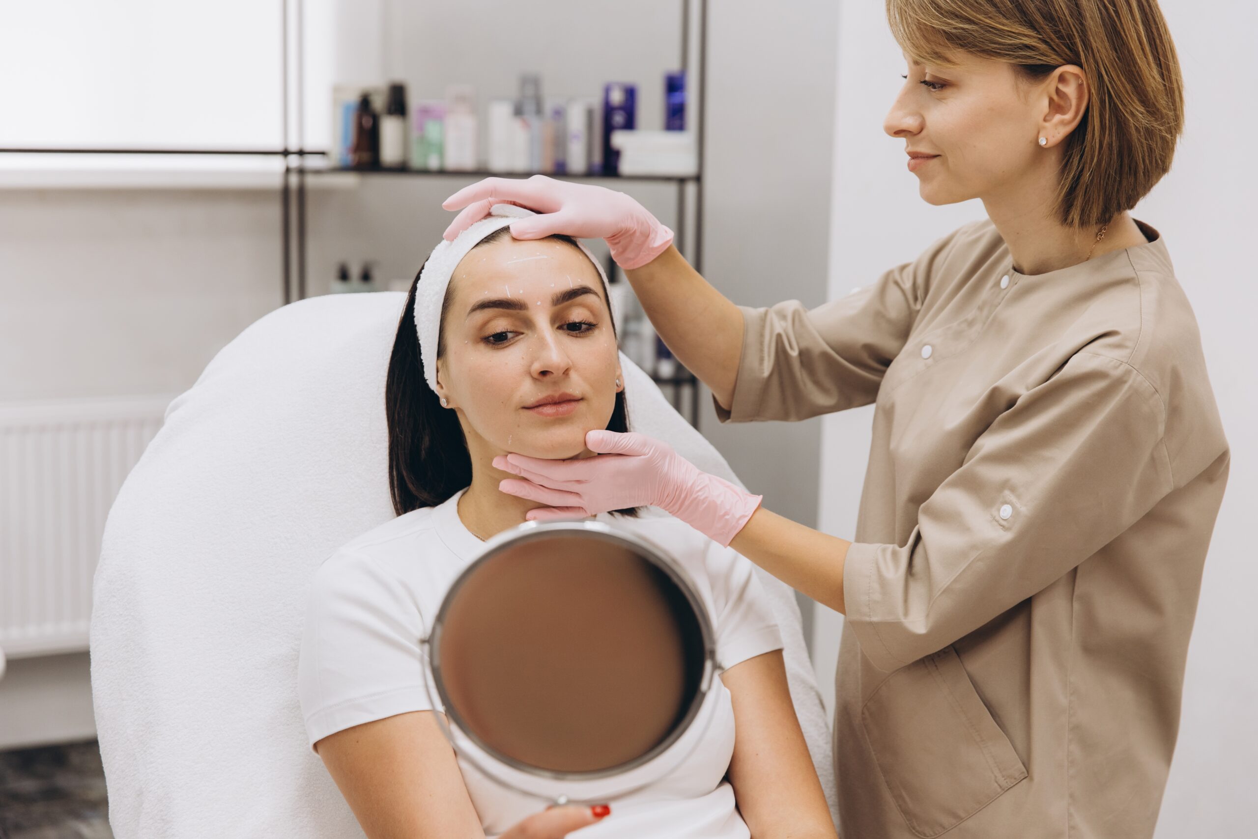 A person consulting with a doctor at a cosmetic clinic
